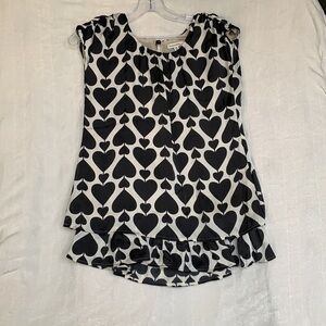 Girls heart dress size 7/8. Black hearts tan background.